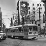 Photo by Don Sims from the PRS Collection. Los Angeles Transit Lines 1532 at Broadway and Olympic Blcd, exact date unknown at this time. Photographer: Don Sims Location: South Broadway and Olympic Blvd, Los Angeles, California. Railroad: Los Angeles Transit Lines. Car # LATL 1532 Line: 5 Line Date: c. 1950 Image notes: Car is turning from South Broadway to Broadway Place. Broadway Place no longer exists, therefore we did not use this image for the Los Angeles Railway Past & Present project. Scanned from an 11 x 14 Print from the Pacific Railroad Society collection in San Dimas Ca.