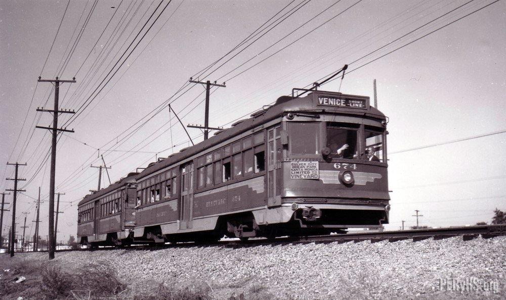 The 674 heads up a 2 car train on the Venice Short Line in this 1948 view.