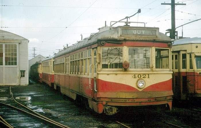 The end of the line. PTC 4021 (PE 673-5076) and other cars await the scrapper's torch after total abandonment of PTC passenger service in late 1958.