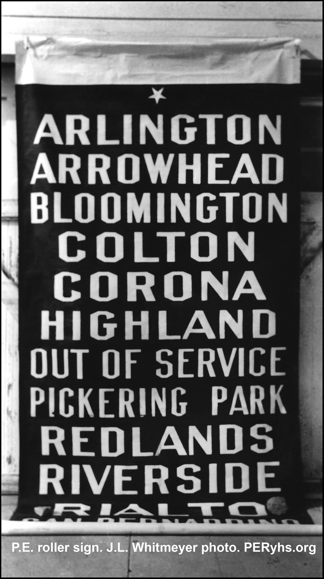 Pacific Electric roller sign showing service of towns and cities in and around the San Bernardino – Riverside area. Jack L. Whitmeyer photo. C.1940, PERyhs.org Pacific Electric roller sign showing service of towns and cities in and around the San Bernardino – Riverside area. Jack L. Whitmeyer photo. C.1940, PERyhs.org