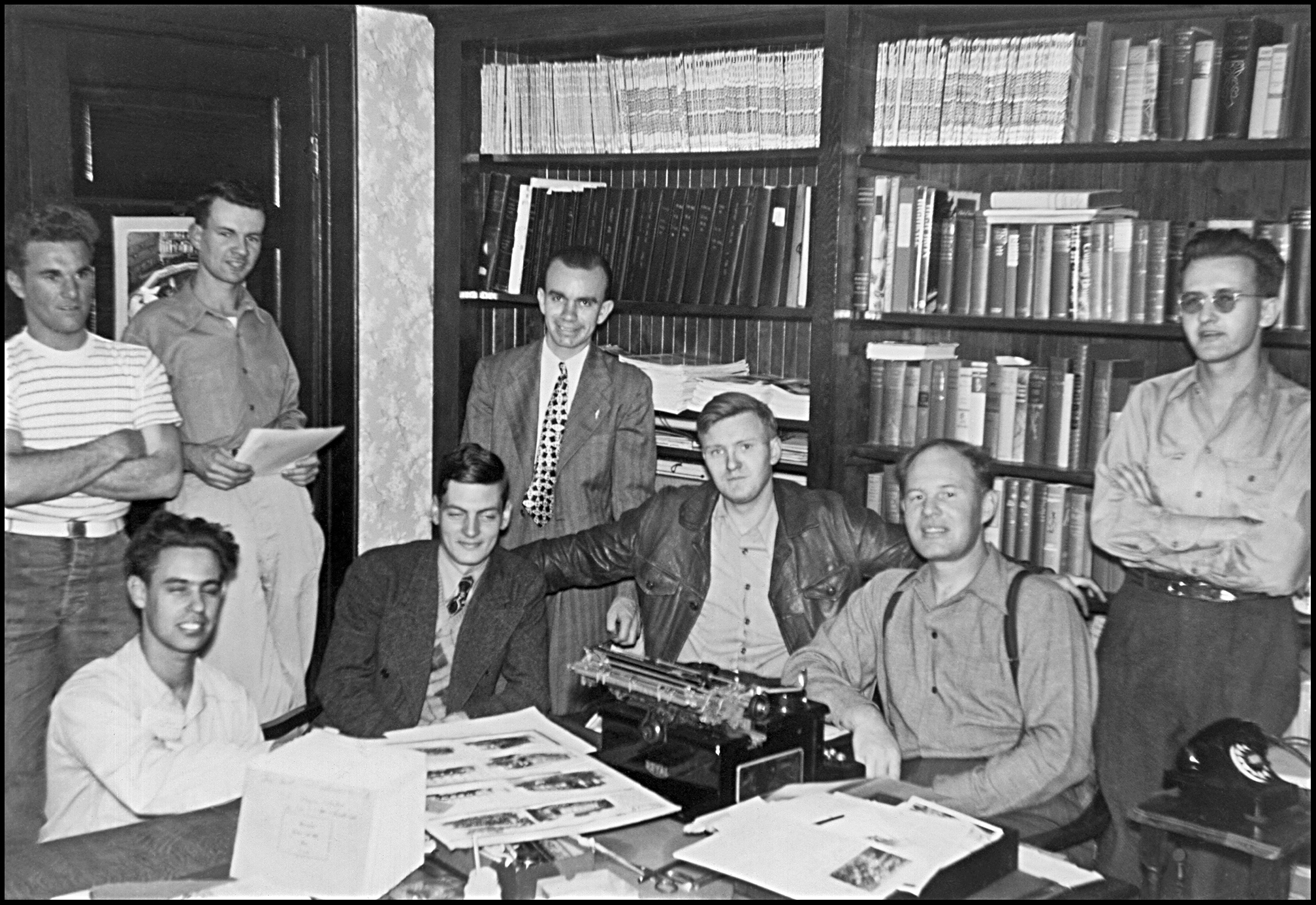 Seated at the typewriter is traction historian Ira L. Swett seen here with other traction fans at his home at 1416 S. Westmoreland Ave in Los Angeles, c.1950. Standing, second from the left is cartographer Raymond E. Younghans, the creator of many of the map published in Ira’s Interurban Specials.